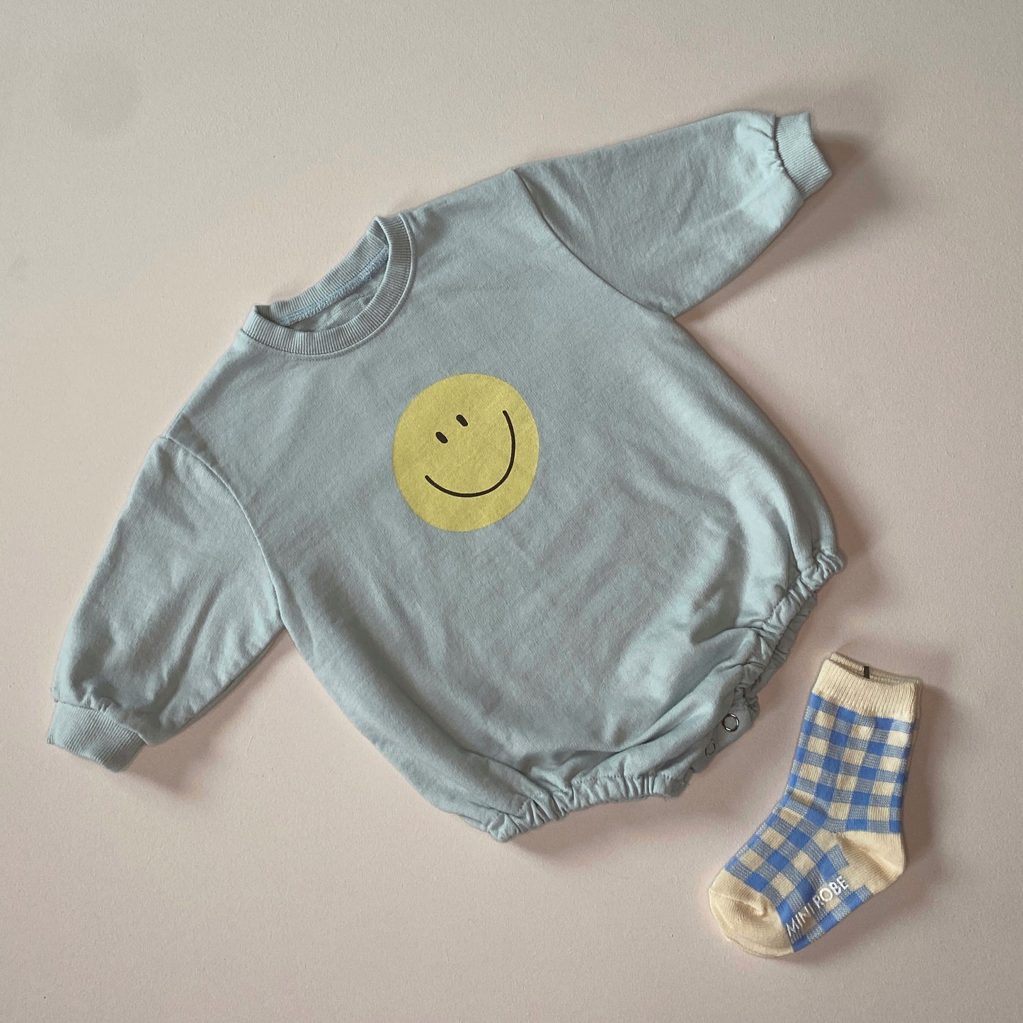 Smile sweater onesie - Sky blue